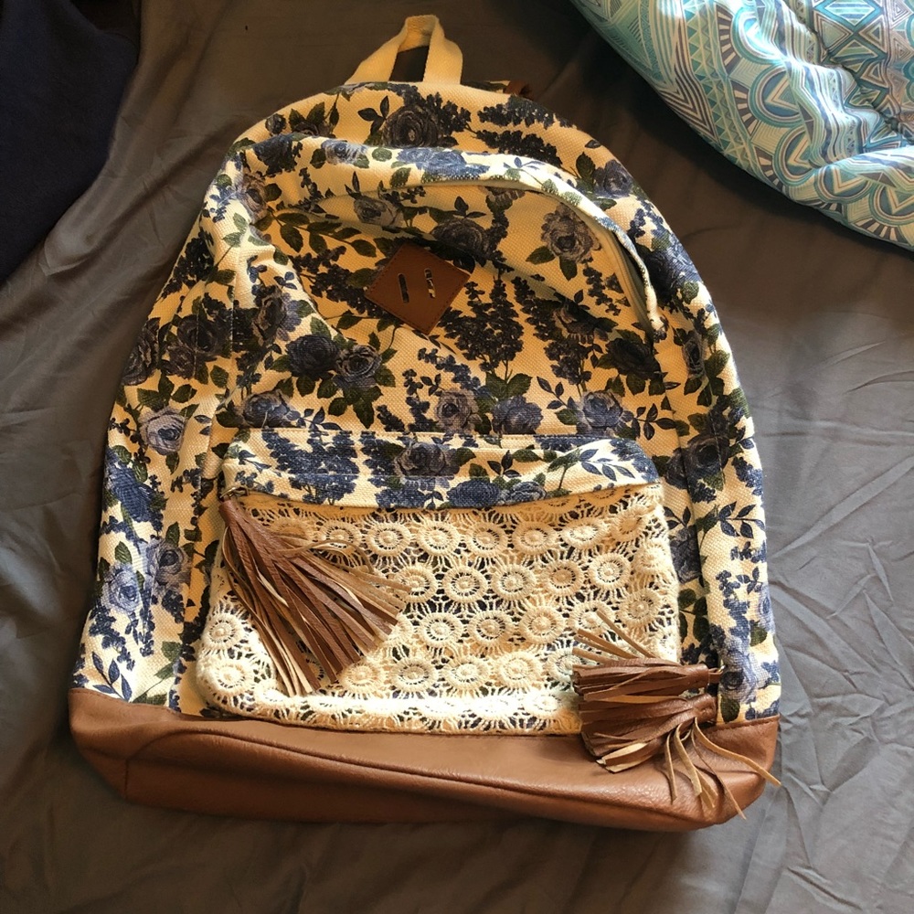 Blue rose print and faux leather backpack